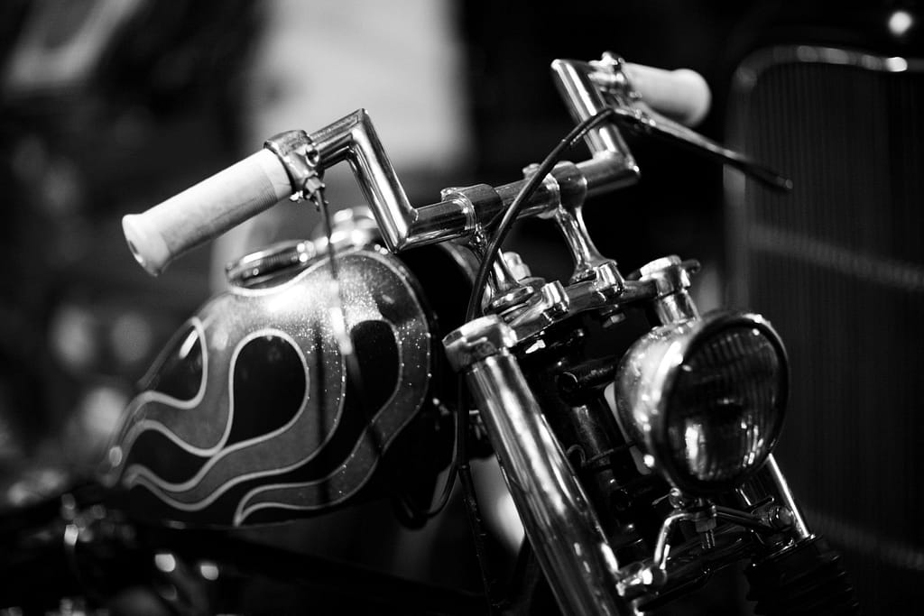 Chrome Motorcycle Roaring Through a Neon City at Midnight