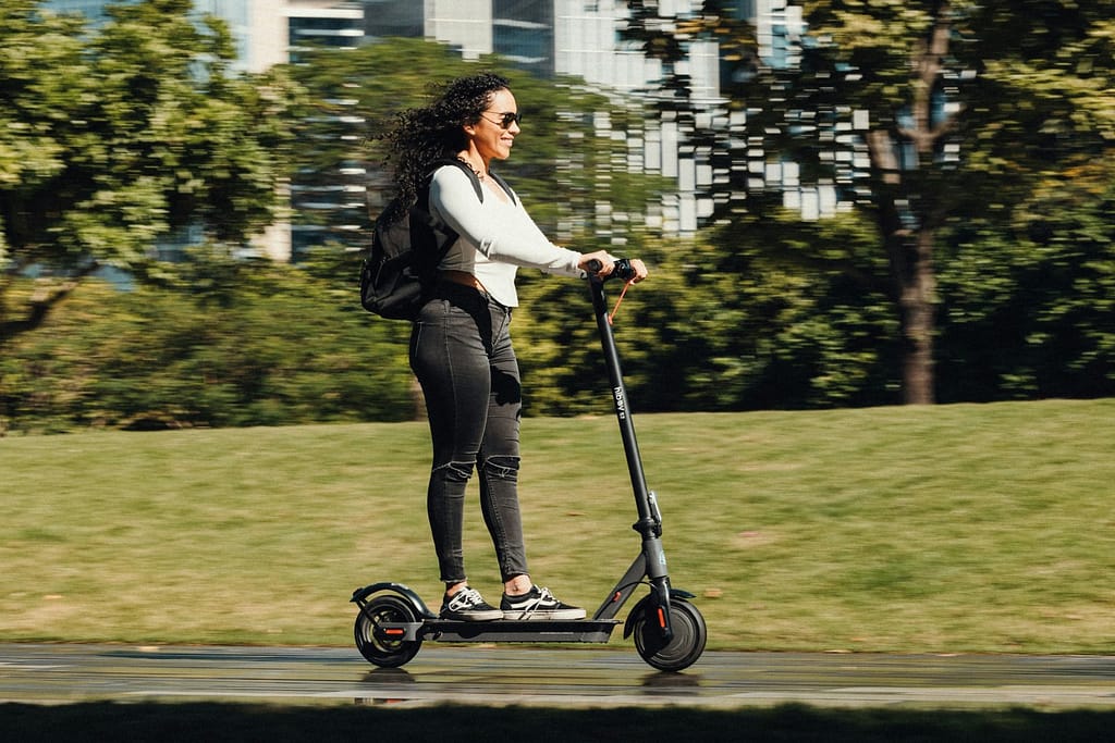 Electric Scooter Gliding Through a Modern City Park