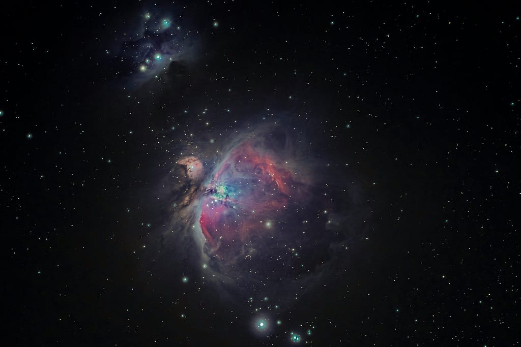Colorful Orion Nebula Glowing in a Deep Starfield
