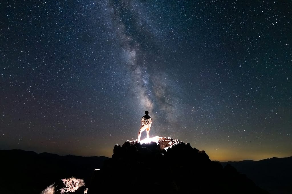 Milky Way Stretching Over a Quiet Mountain Valley
