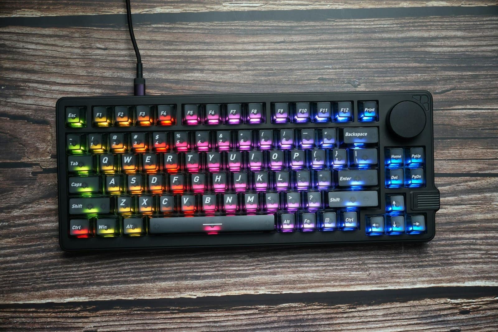 Gaming Keyboard Glowing with RGB Lights in Darkness