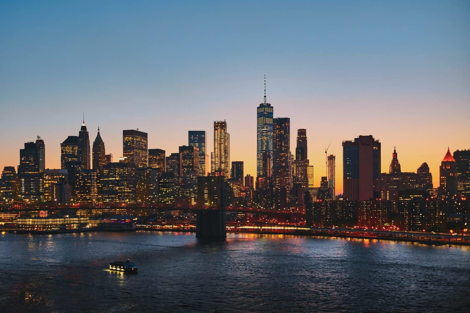 New York City Skyline Shining Over Hudson River at Night