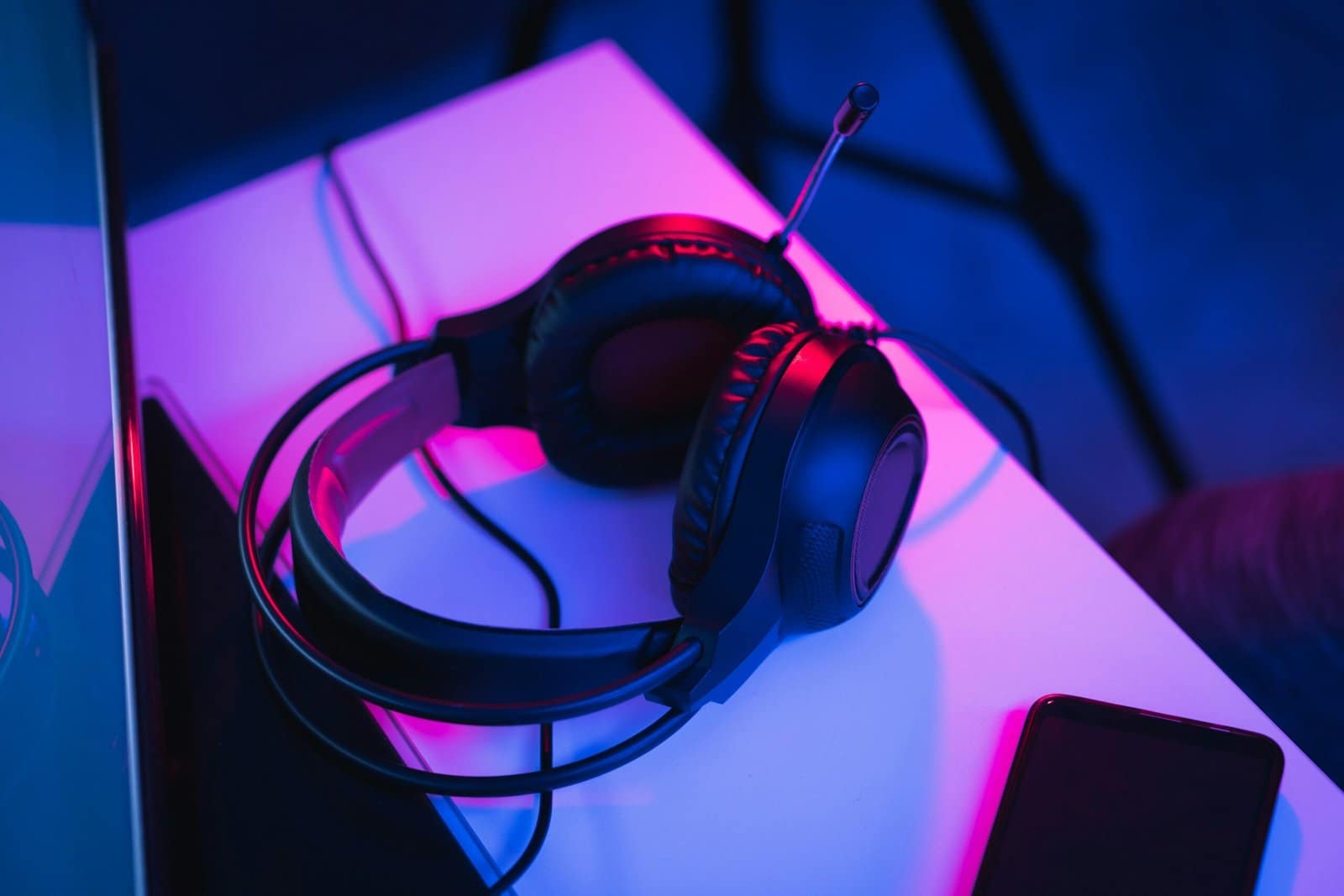 Gaming Headset Glowing on a Neon Desk Setup