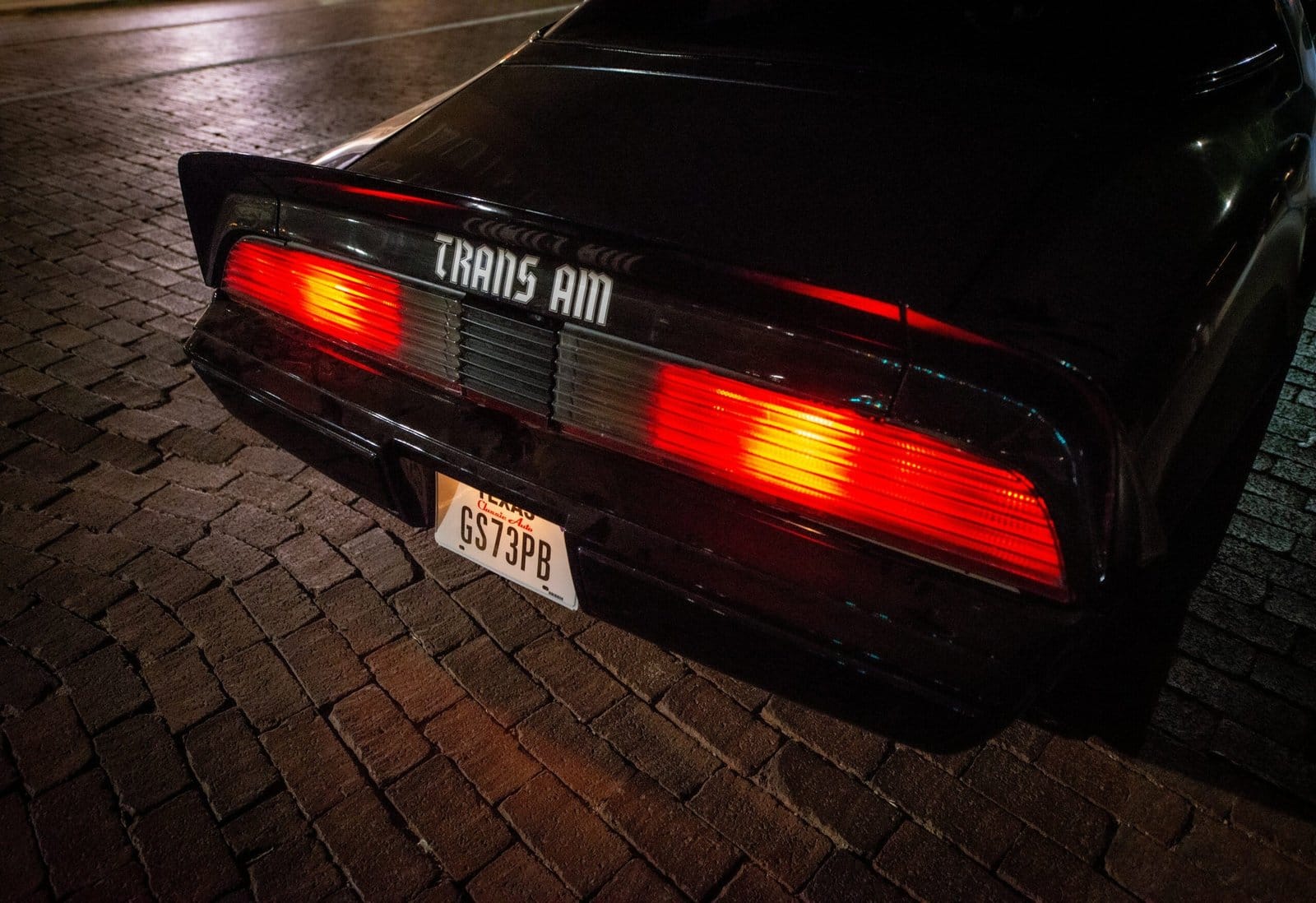 Retro Muscle Car Roaring Down Night Highway