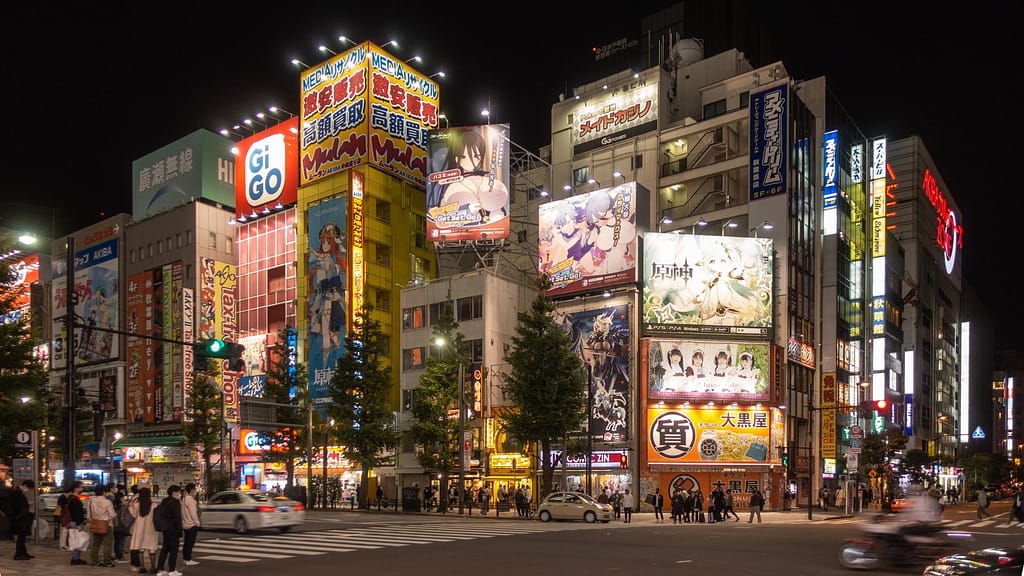Anime Billboards Glowing Over Akihabara Streets at Night