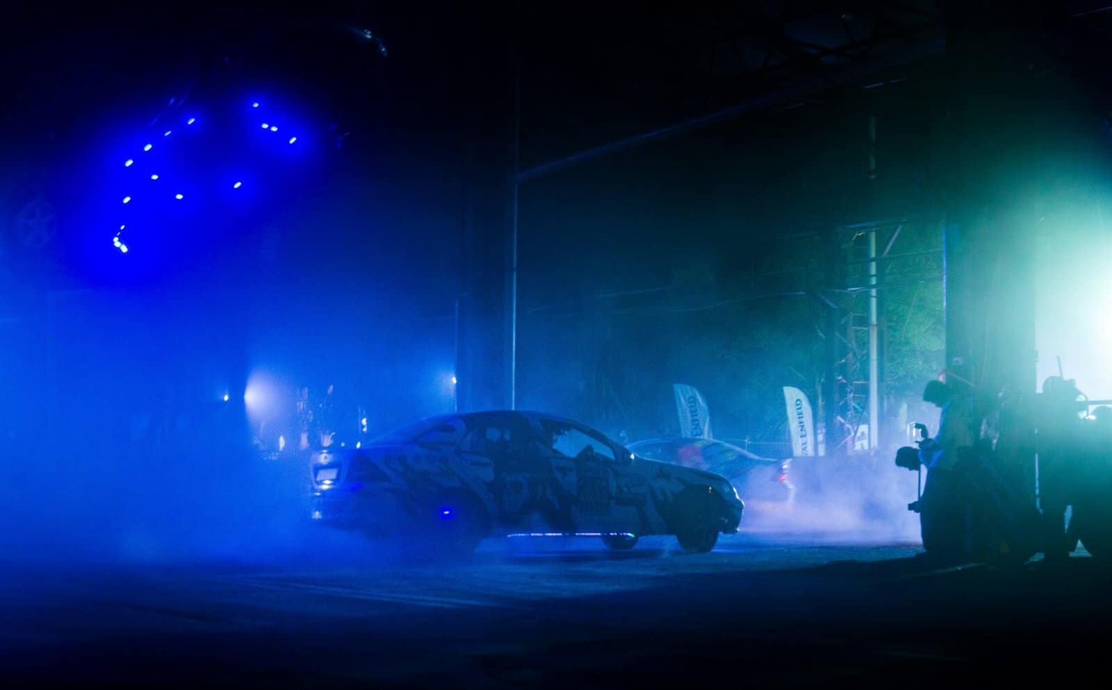 Drift Car Sliding Through Smoke On Night Street