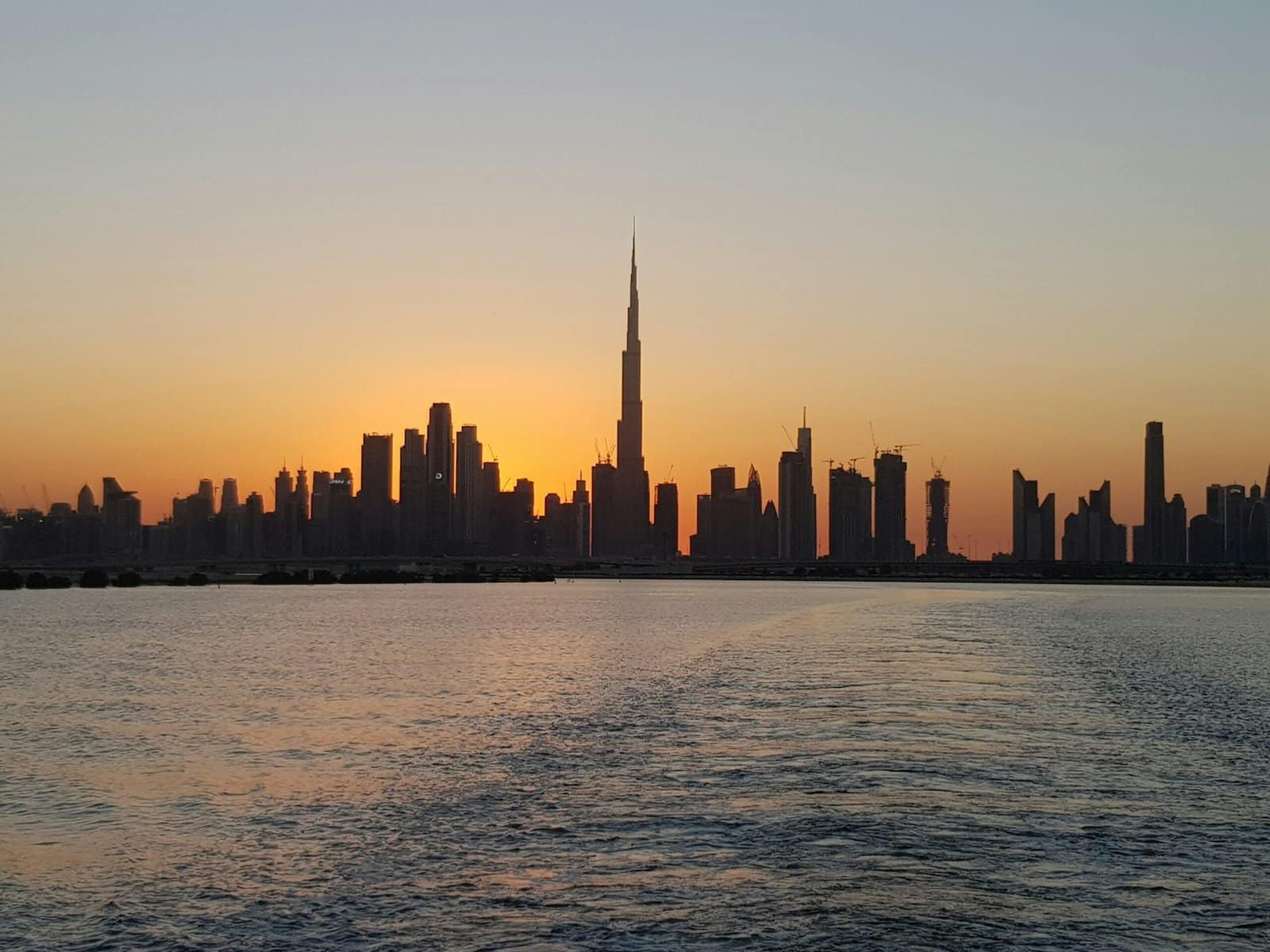 Burj Khalifa Piercing Golden Sunset Clouds