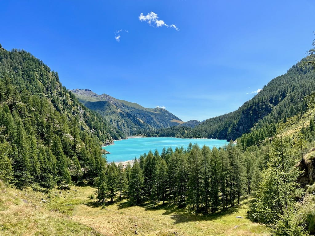Turquoise Alpine Lake Beneath Snowy Peaks