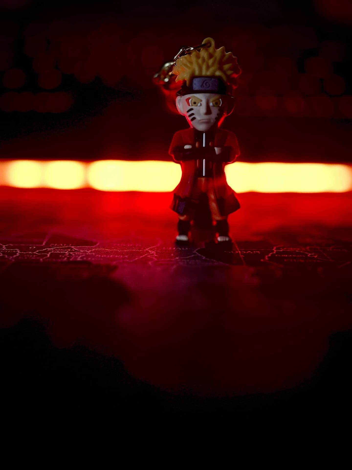 Naruto Standing Before a Glowing Red Background