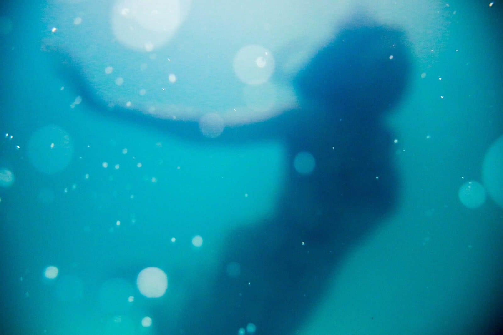 Ethereal Mermaid in a Glowing Ocean