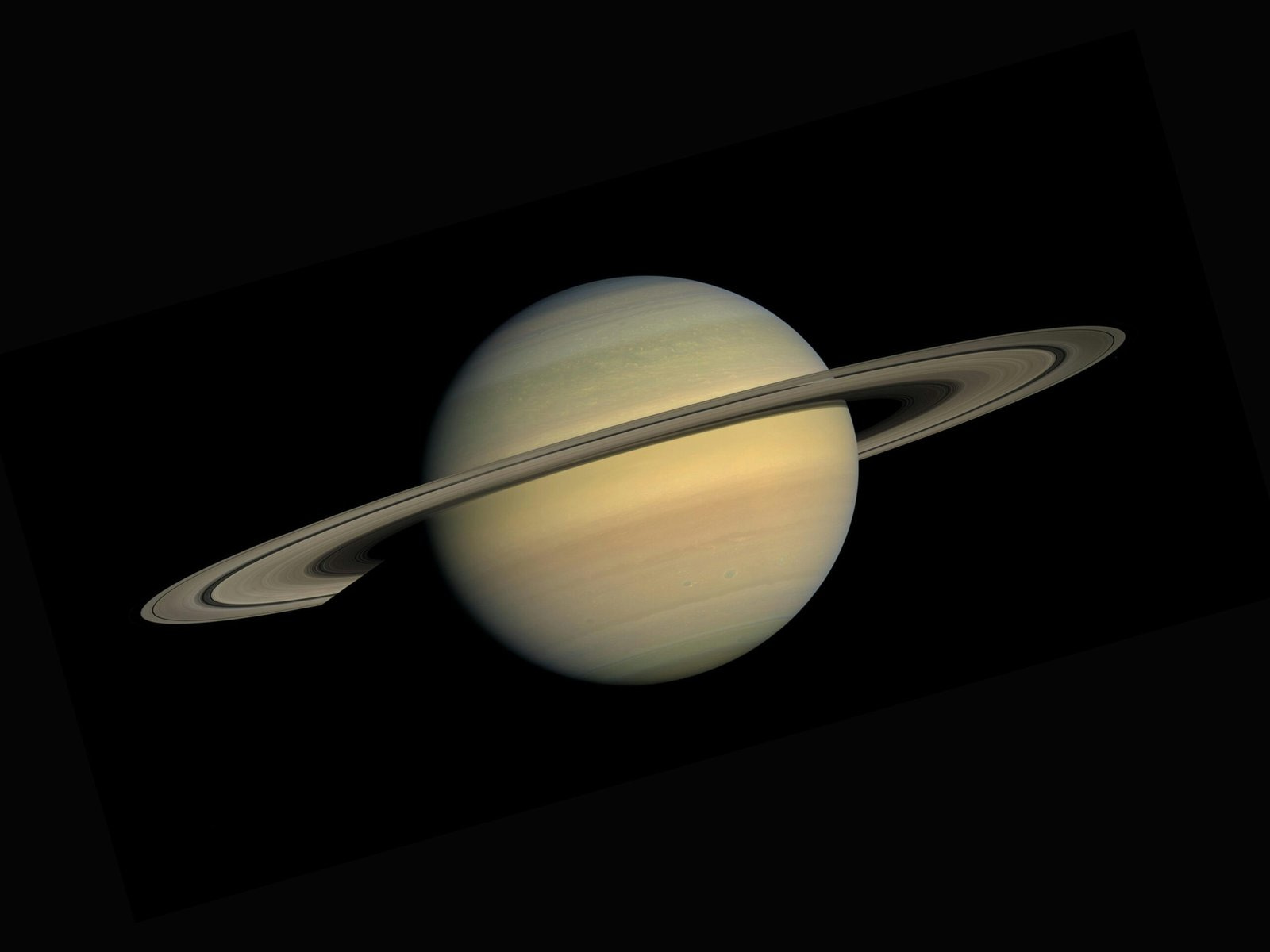 Ringed Planet Glowing Against Starfield Darkness