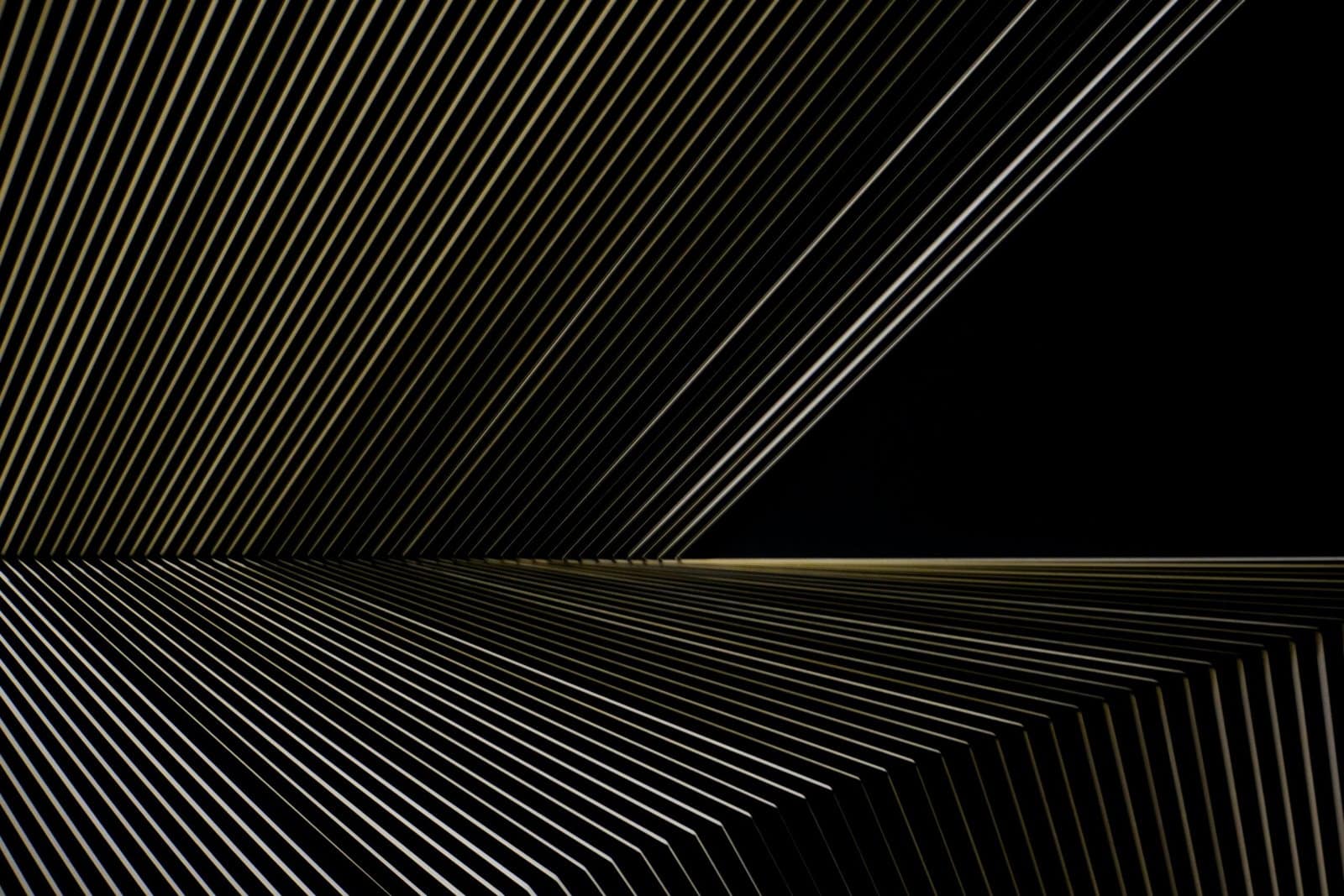 Golden Geometric Lines on Dark Canvas