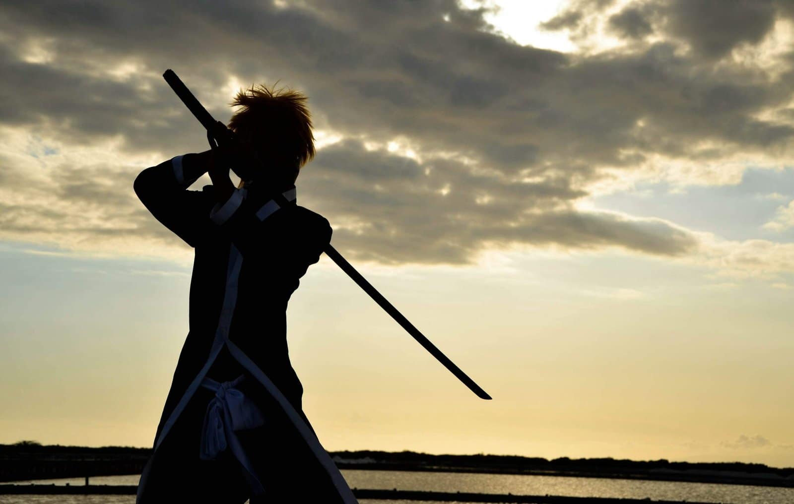 Samurai Silhouette at Sunset with Drawn Katana