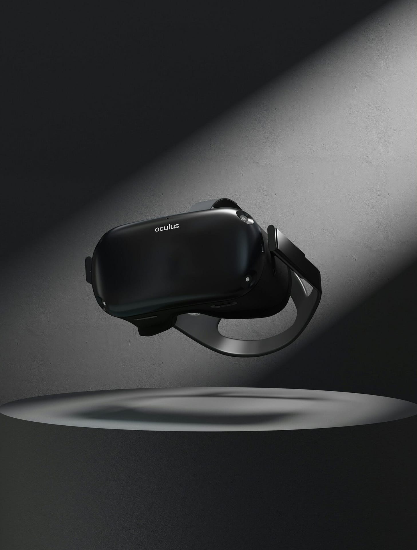 Black VR Headset on a Dark Stage Under a Spotlight