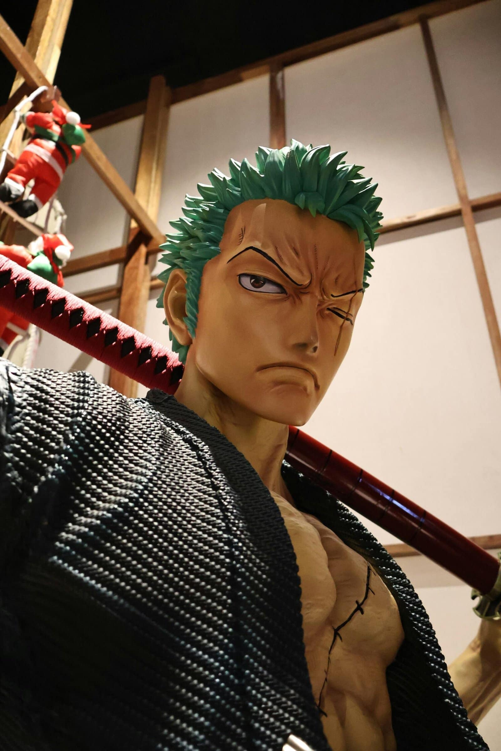 Anime Swordsman with Green Hair Holding a Sword