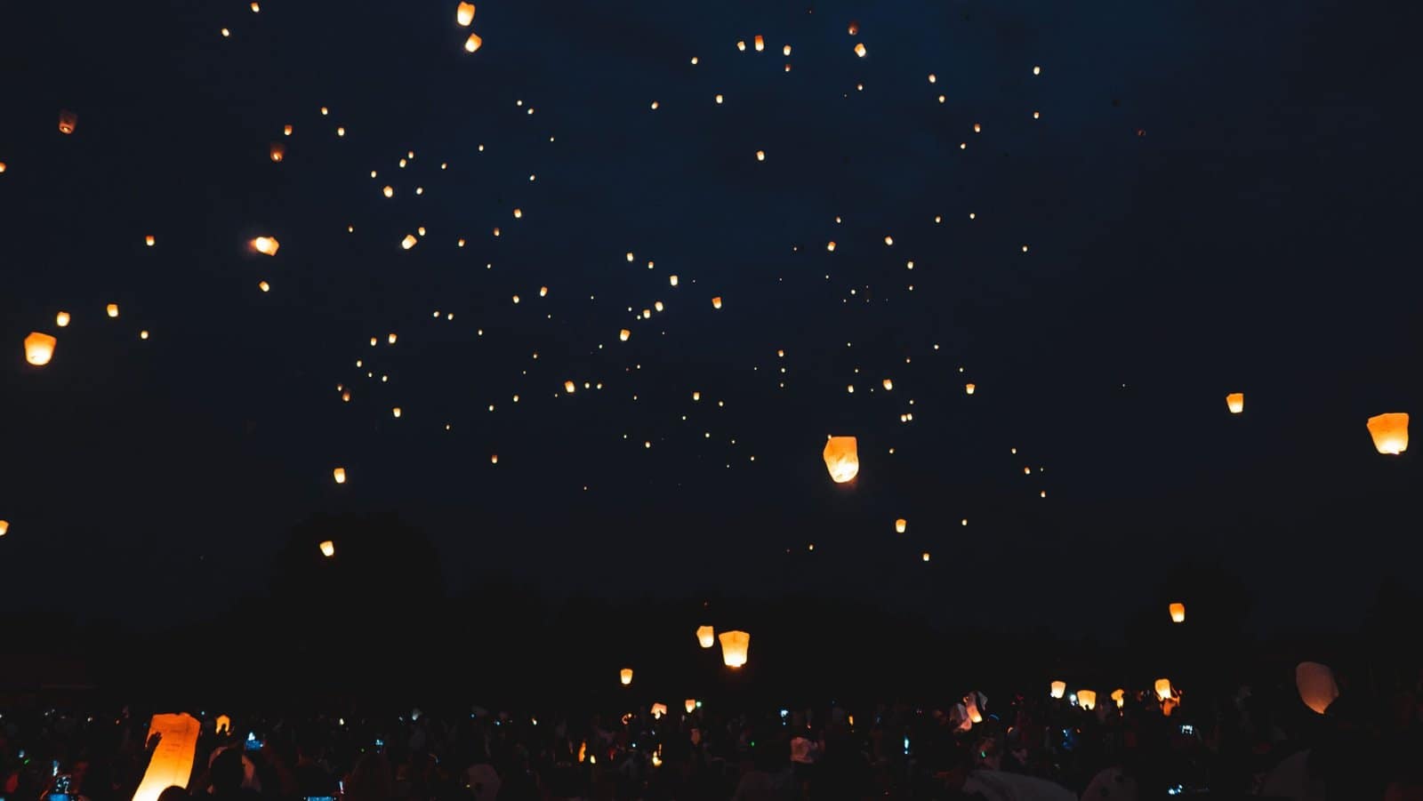 Sky Lanterns Rising Over a Festival Night Sky