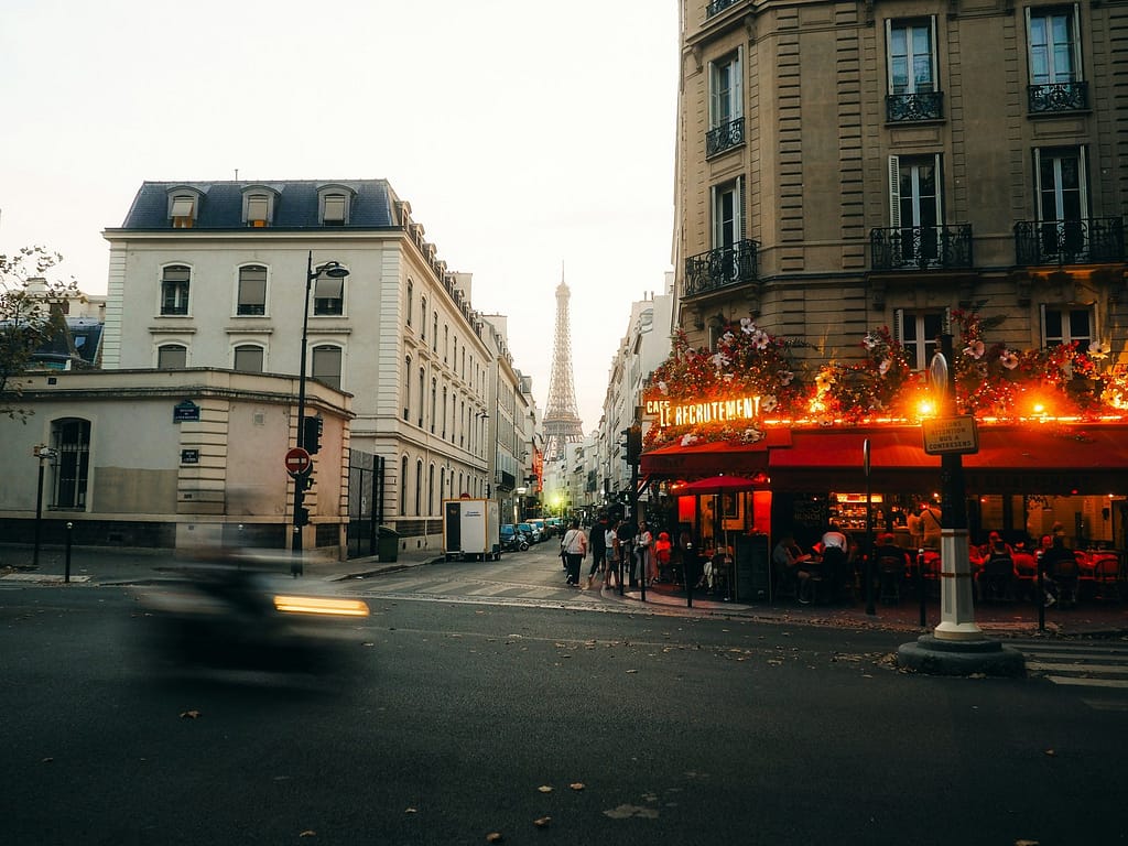 Paris Street Cafe at Dusk with Warm Lights