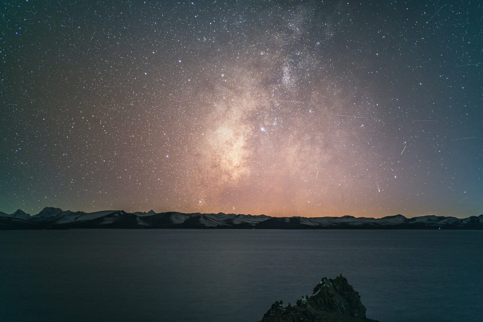 Milky Way Over a Snowy Mountain Lake